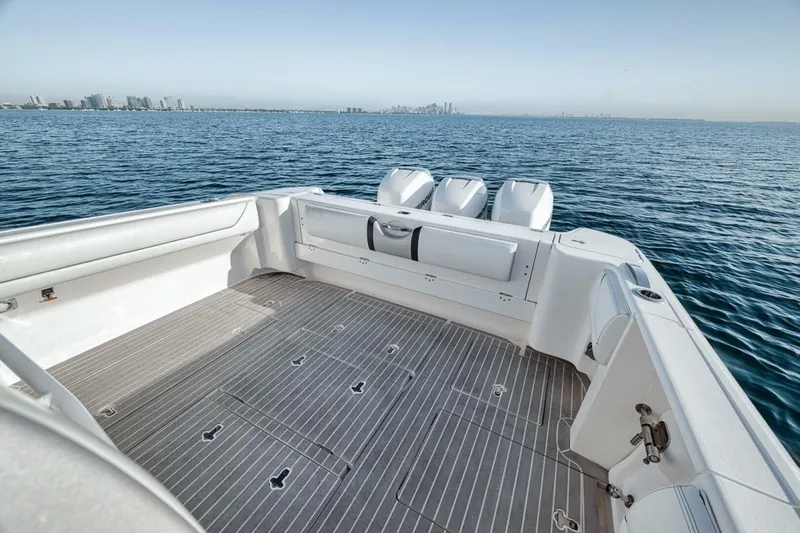 Yacht Photos Pics 2019 Intrepid 407 Panacea boat with spacious deck and triple engines on open water.