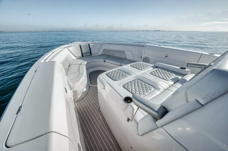  Yacht Photos Pics 2019 Intrepid 407 Panacea boat interior with luxurious seating on open water.