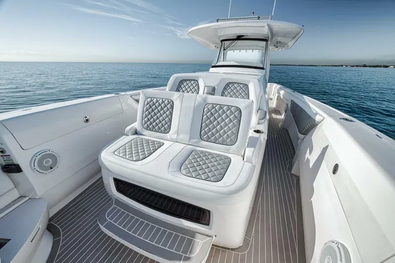  Yacht Photos Pics 2019 Intrepid 407 Panacea boat with luxurious seating on open water.