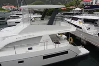 Leopard 43 Powercat 2020 docked at marina with scenic mountain backdrop.