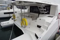 2020 Leopard 43 Powercat yacht docked, featuring spacious deck and modern design.