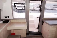 Interior of 2020 Leopard 43 Powercat yacht with modern design and outdoor access.