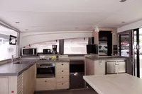 Interior of 2020 Leopard 43 Powercat yacht featuring modern kitchen appliances and sleek design.