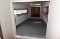 Interior cabin of 2020 Leopard 43 Powercat, featuring a cozy sleeping area.