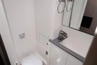 Bathroom interior of 2020 Leopard 43 Powercat, featuring modern fixtures and sleek design.