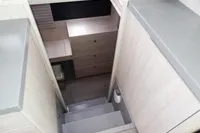 Interior stairs of 2020 Leopard 43 Powercat, leading to lower cabin area.