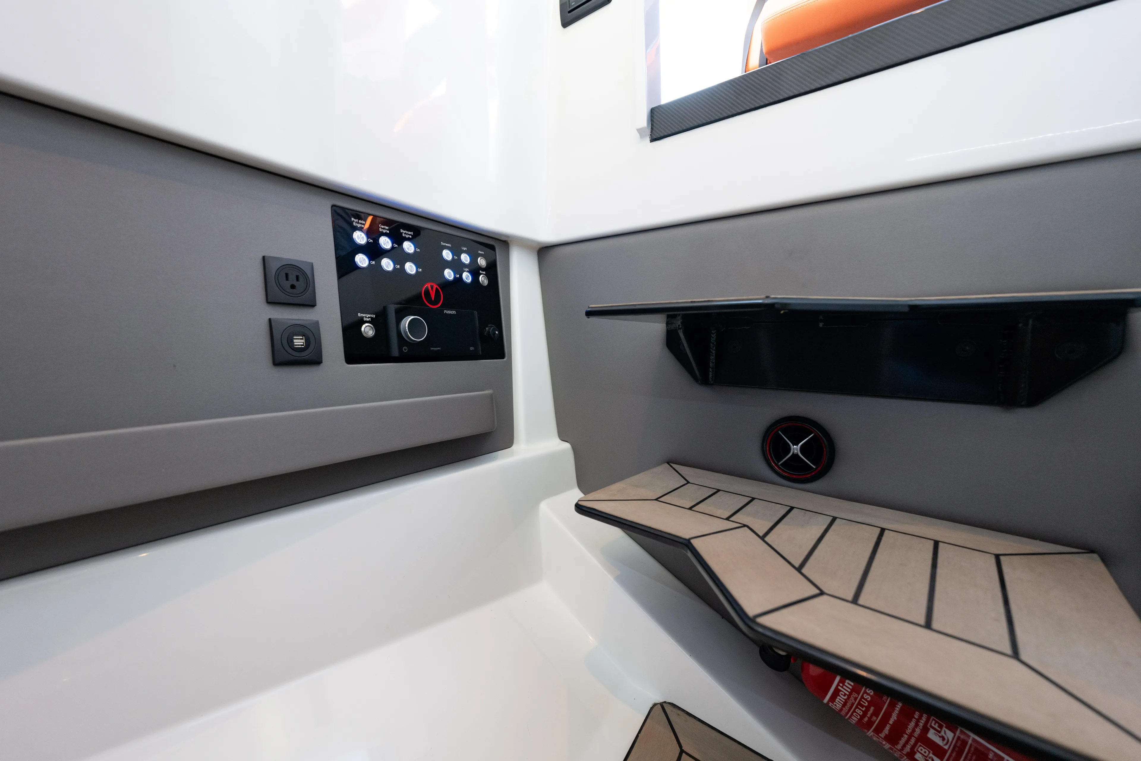  Yacht Photos Pics 2023 Vanquish Yachts Sports Line Outboard interior with control panel and modern design.