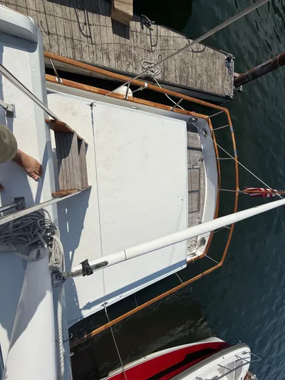 Aja Marie Yacht Photos Pics 1986 Marine Trader Tri Cabin yacht docked at a marina, viewed from above.