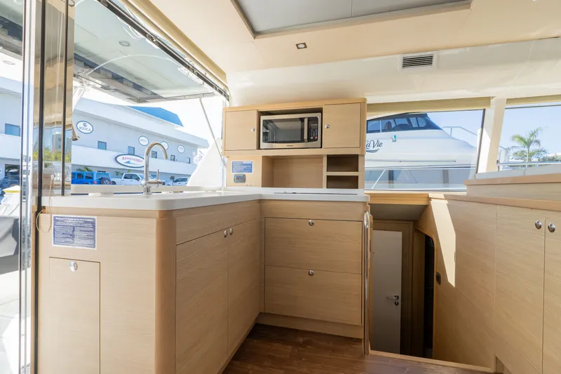  Yacht Photos Pics Interior of 2023 Aquila 44 Yacht featuring modern kitchen.