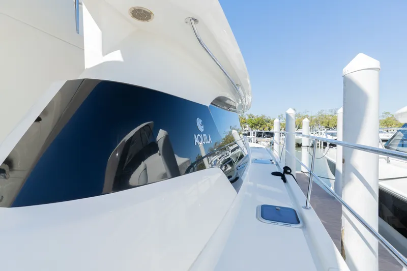  Yacht Photos Pics Aquila 44 Yacht 2023 at dock, modern design.