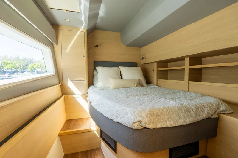  Yacht Photos Pics Interior of 2023 Aquila 44 Yacht featuring cozy bedroom.