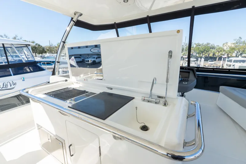 Yacht Photos Pics Aquila 44 Yacht 2023 featuring modern outdoor kitchen and sink.
