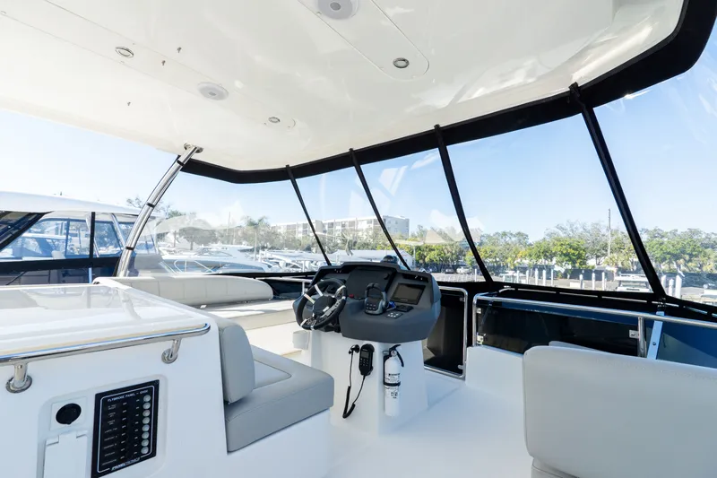  Yacht Photos Pics Interior of 2023 Aquila 44 Yacht with modern helm station.