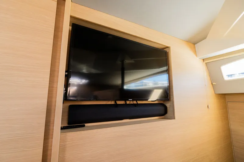 Yacht Photos Pics Flat-screen TV inside 2023 Aquila 44 Yacht interior.
