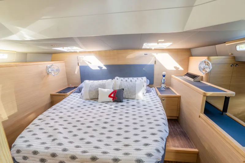 Yacht Photos Pics Interior of 2023 Aquila 44 Yacht featuring cozy bedroom.