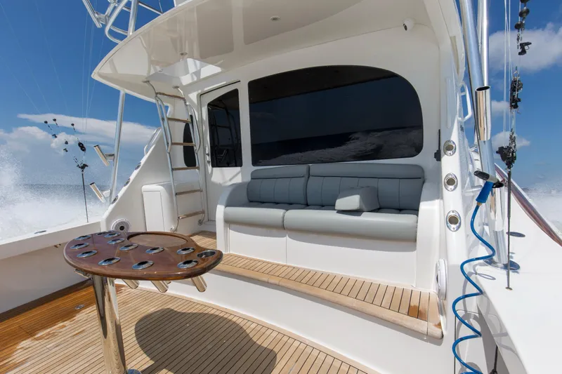 Reel Petty Yacht Photos Pics Luxurious 2017 Viking 48 Convertible yacht deck with seating and fishing rod holders.