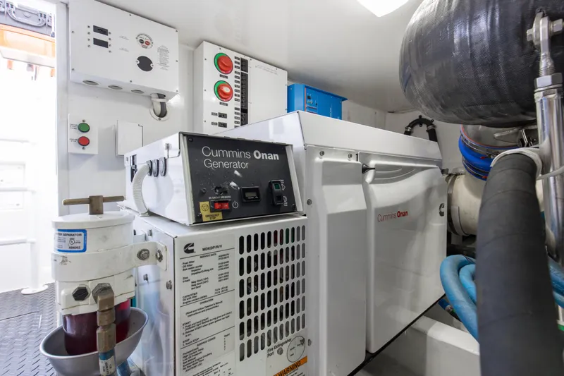 Reel Petty Yacht Photos Pics Engine room of 2017 Viking 48 Convertible with Cummins Onan generator.