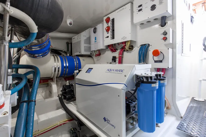 Reel Petty Yacht Photos Pics Engine room of 2017 Viking 48 Convertible yacht with Aqua Matic system and control panels.