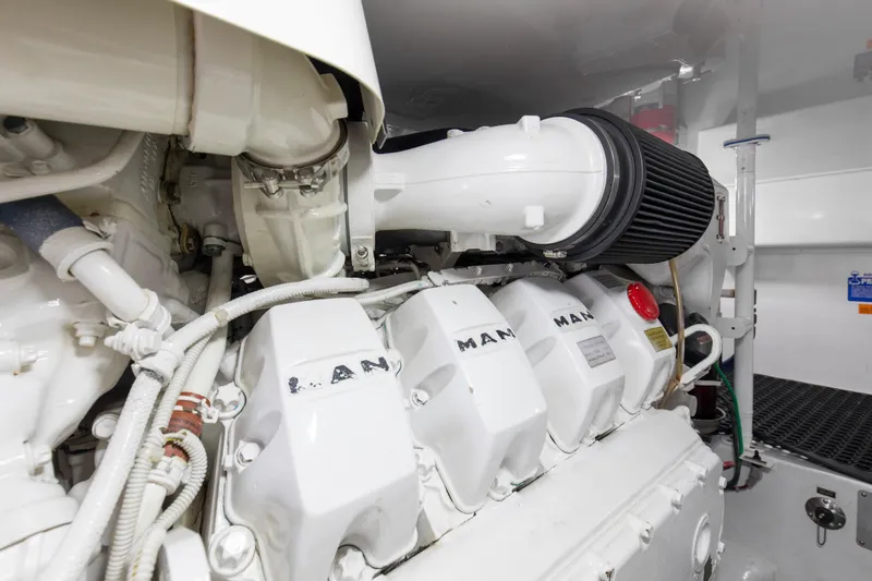 Reel Petty Yacht Photos Pics Engine room of 2017 Viking 48 Convertible yacht, featuring a MAN engine.