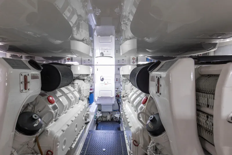 Reel Petty Yacht Photos Pics Engine room of 2017 Viking 48 Convertible yacht, showcasing dual engines and clean design.