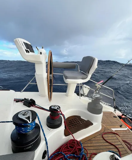 Mersea Yacht Photos Pics Catana 582 sailboat helm with ocean view, featuring ropes and winches, 2001 model.