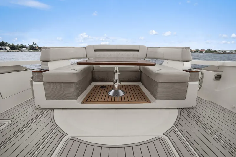 Twelve Yacht Photos Pics Luxurious seating area on 2022 Tiara Sport 43 LS yacht with ocean view.