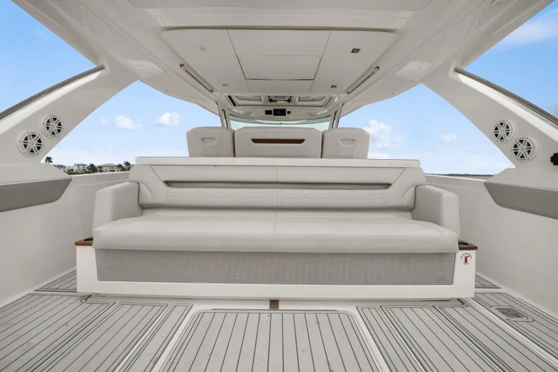 Twelve Yacht Photos Pics 2022 Tiara Sport 43 LS luxury boat interior with spacious seating and modern design.