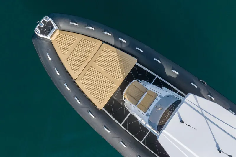  Yacht Photos Pics Manufacturer Provided Image: Aerial view of 2025 Highfield Sport 800 boat with tan seating and sleek design.