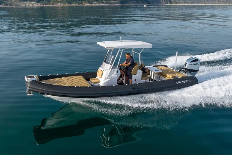  Yacht Photos Pics Manufacturer Provided Image: 2025 Highfield Sport 800 boat cruising on calm water.