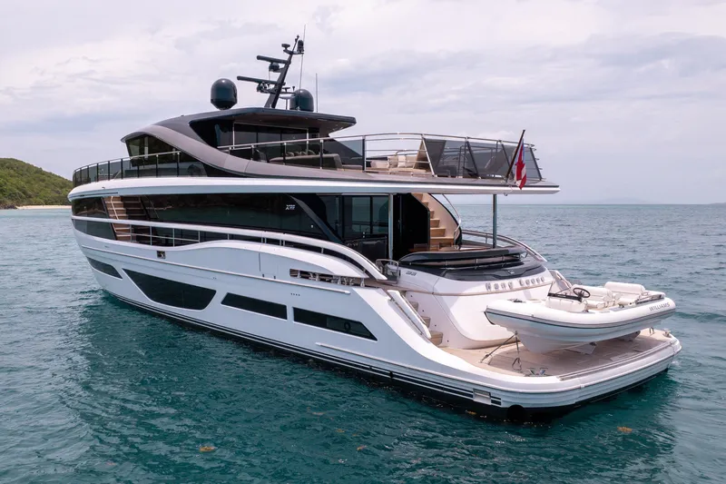 Hang Loose Yacht Photos Pics Luxurious 2021 Princess X95 yacht on serene ocean waters.