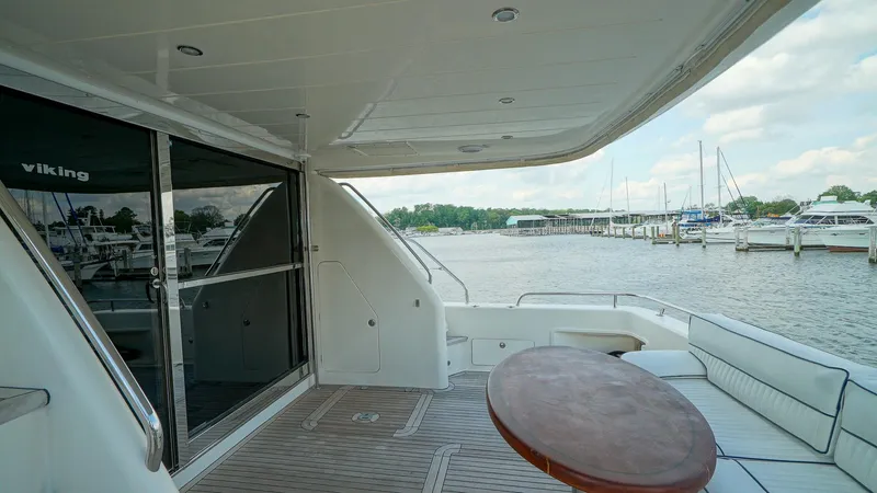 Laurie Lu Yacht Photos Pics Spacious deck of 2002 Viking Princess 68 yacht with marina view.