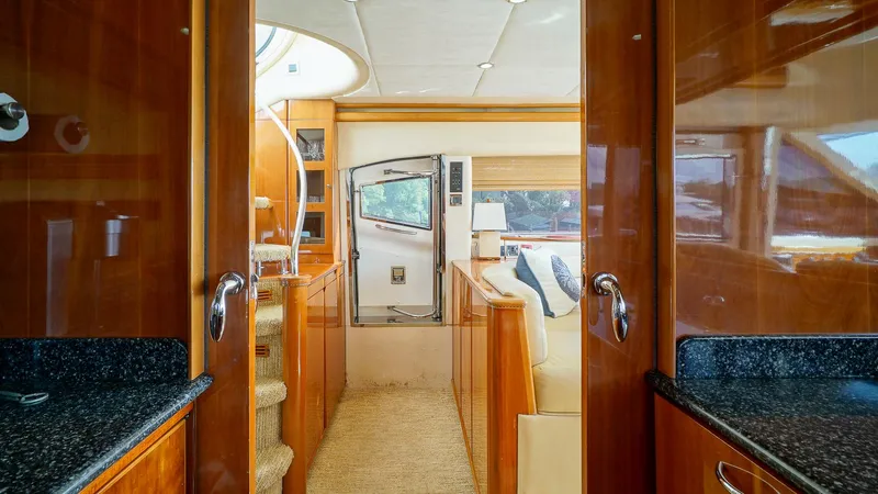Laurie Lu Yacht Photos Pics Luxurious interior of 2002 Viking Princess 68 yacht with polished wood and modern design.