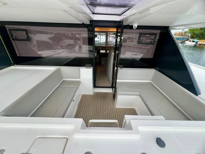 Win Win Yacht Photos Pics Luxurious 2022 Leopard 50 yacht interior with spacious seating and modern design.