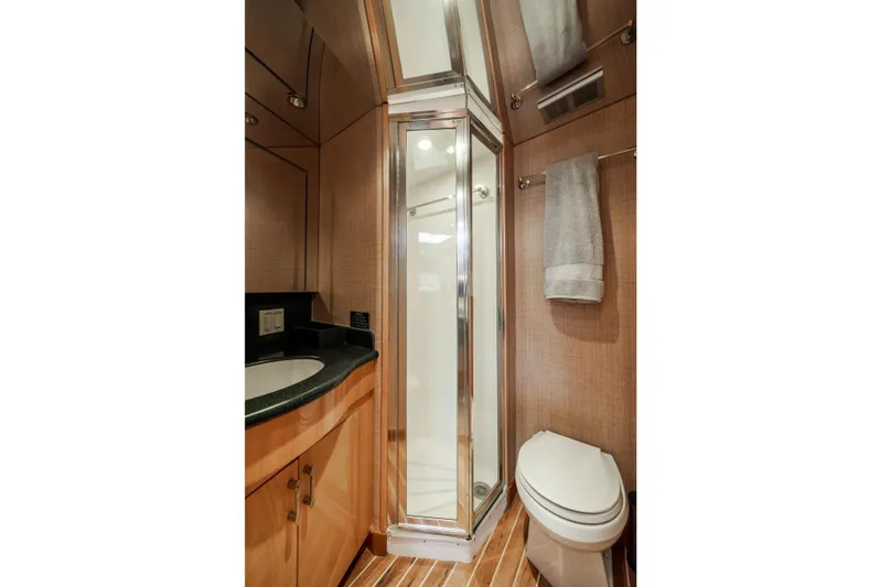 Wet Hooker Yacht Photos Pics Luxurious bathroom in 2003 Hatteras 60 Convertible yacht with shower and toilet.