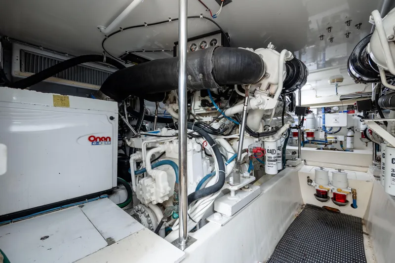 Wet Hooker Yacht Photos Pics Engine room of 2003 Hatteras 60 Convertible yacht with Onan generator and CAT engines.