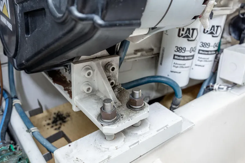 Wet Hooker Yacht Photos Pics Engine components of a 2003 Hatteras 60 Convertible with CAT marine oil filters.