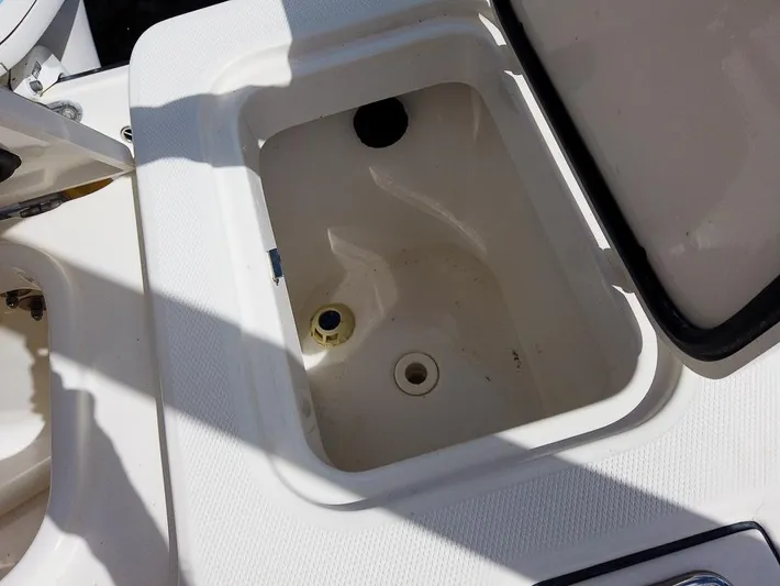  Yacht Photos Pics Open storage compartment on a 2015 Edgewater 320CC boat.
