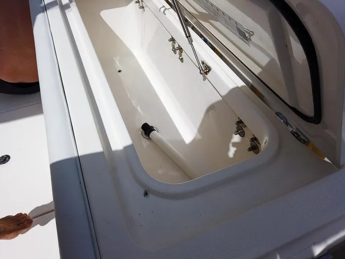  Yacht Photos Pics Open storage compartment on a 2015 Edgewater 320CC boat.