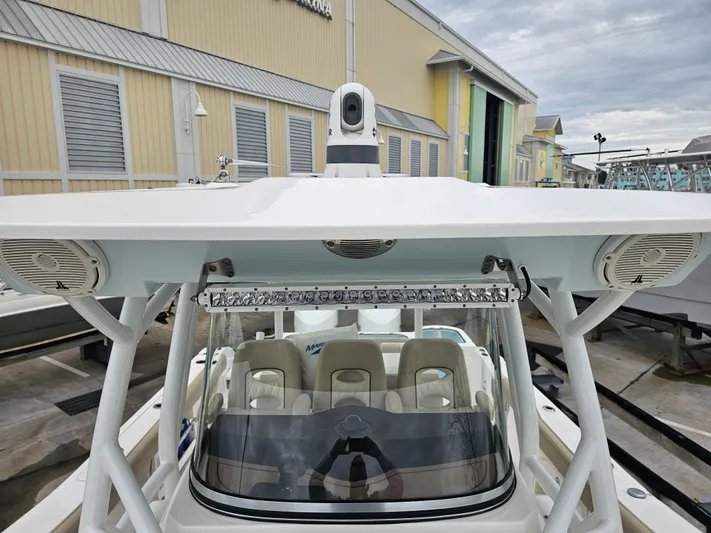  Yacht Photos Pics 2018 Sea Fox 328 Commander boat with modern features at the marina.