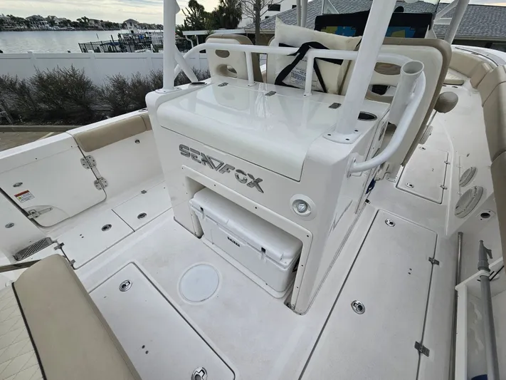  Yacht Photos Pics Interior view of a 2018 Sea Fox 328 Commander boat by the water.