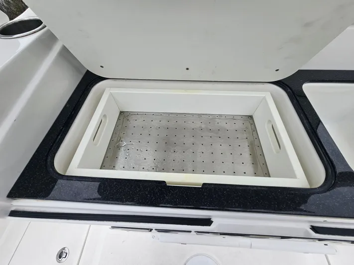  Yacht Photos Pics Cooler compartment on a 2018 Sea Fox 328 Commander boat.