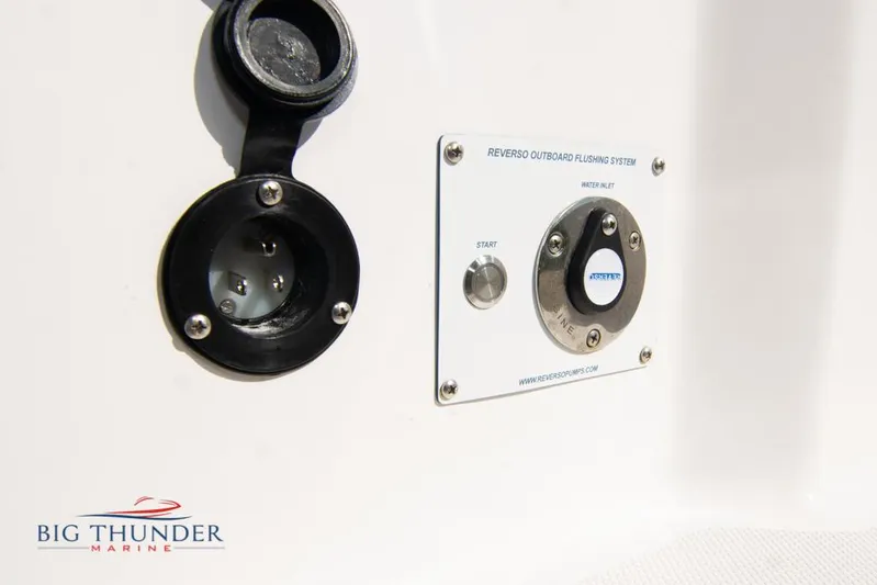  Yacht Photos Pics 2022 Fountain 32 NX Reverso outboard flushing system, Big Thunder Marine branding visible.