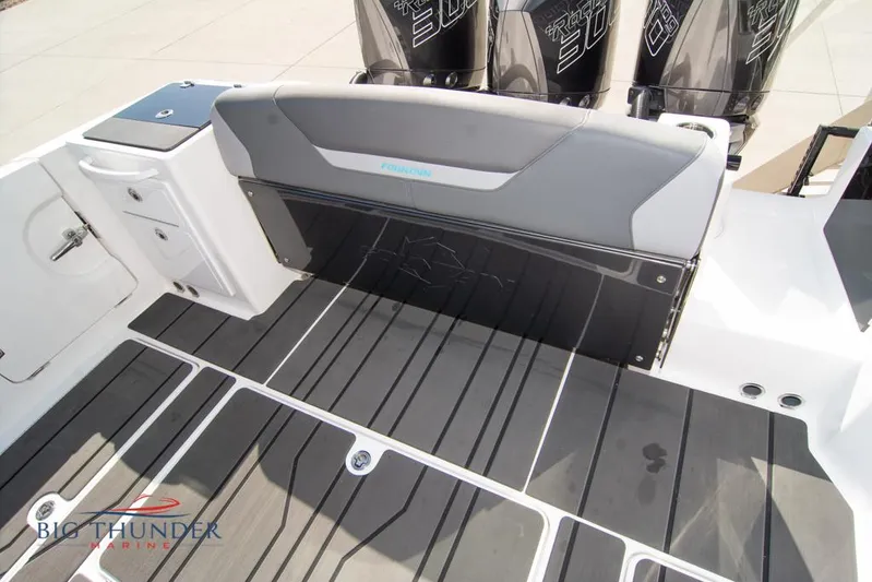  Yacht Photos Pics 2022 Fountain 32 NX boat deck with seating and powerful engines.