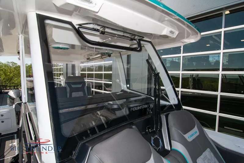  Yacht Photos Pics 2022 Fountain 32 NX boat interior with modern seating and windshield design.