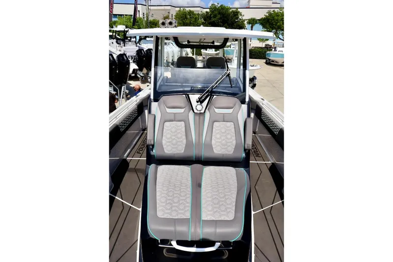  Yacht Photos Pics 2022 Fountain 32 NX boat interior with modern seating and sleek design.