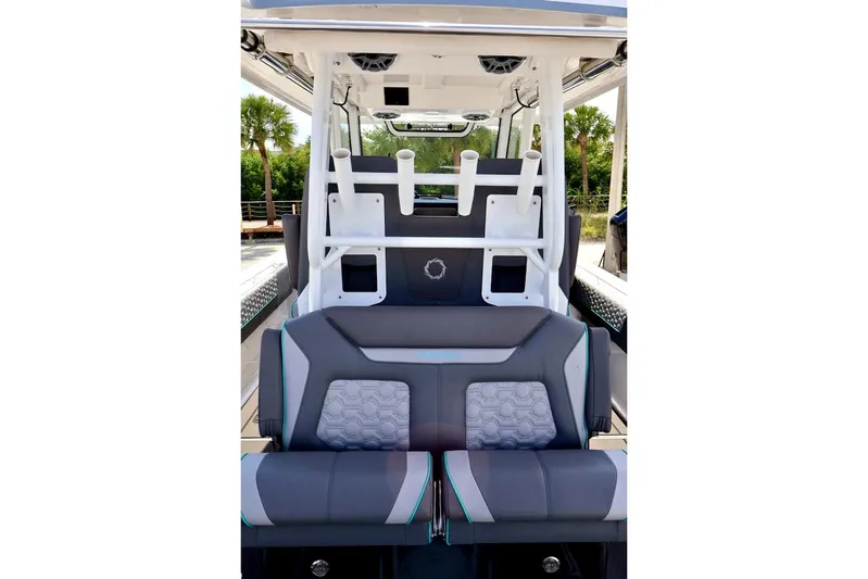  Yacht Photos Pics 2022 Fountain 32 NX boat interior with modern seating and rod holders.