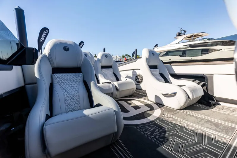  Yacht Photos Pics Luxurious seating on the 2026 Mystic Powerboats C4000, showcasing modern design and comfort.