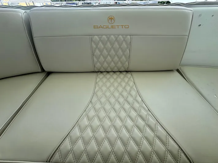  Yacht Photos Pics Luxurious Baglietto 116 yacht seating with diamond stitching, 2000 model.