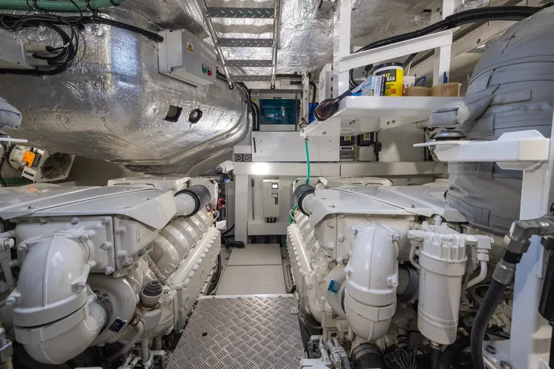 Kb Jr Yacht Photos Pics Engine room of 2020 Sunseeker Predator 74 yacht, showcasing dual engines and equipment.