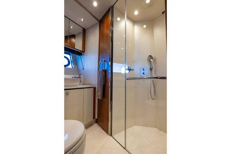 Kb Jr Yacht Photos Pics Luxurious bathroom in 2020 Sunseeker Predator 74 yacht with modern shower and sleek design.